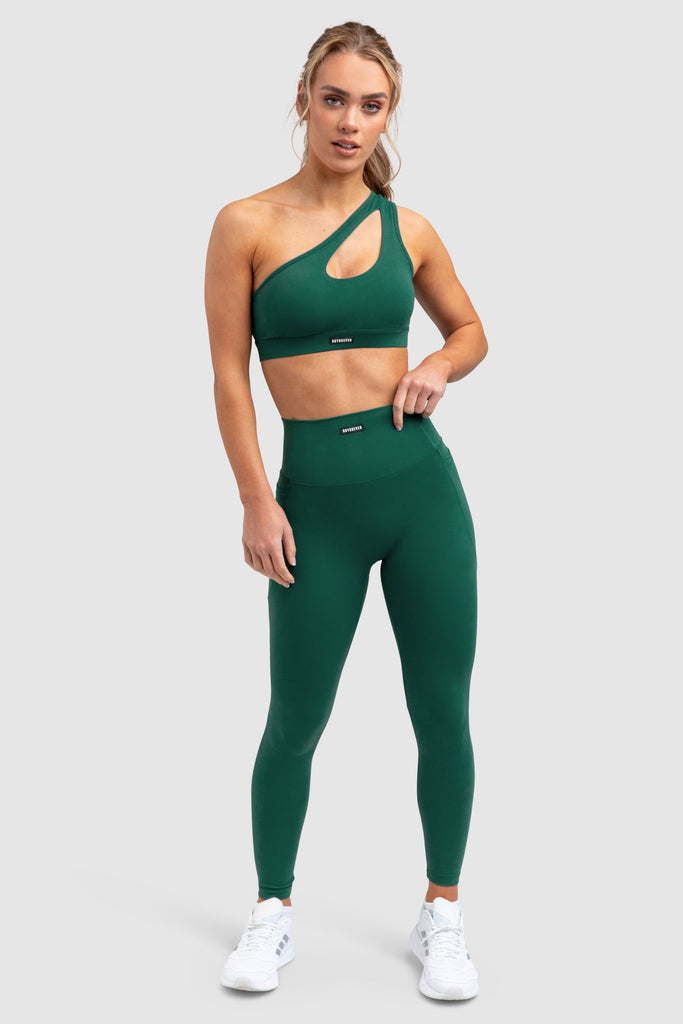 https://www.doyoueven.com/cdn/shop/products/desire-leggings-forest-green-32131131113658_1024x1024.jpg?v=1675900484